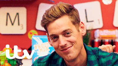 Presenter Sam Homewood smiling.
