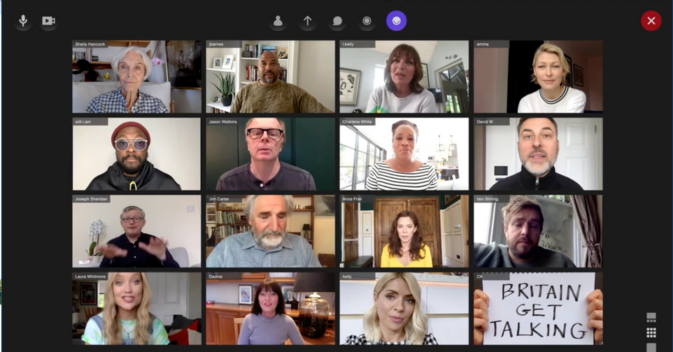 A collection of famous faces on a Zoom call. From top left: Shiela Hancock, John Barnes, Lorraine Kelly, Emma Willis, Will I Am, Jason Watkins, Charlene White, David Walliams, Jim Carter, Anna Friel, Ian Stirling, Laura Whitmore, Davina McCall and Holly Willoughby. One Zoom participant is doing sign language whilst another holds up the sign 'Britain Get Talking.'